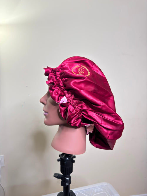 Side view of the House of Adjeh satin bonnet showing its roomy oversized fit